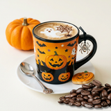 Halloween mug with ghost and spiderweb coffee art